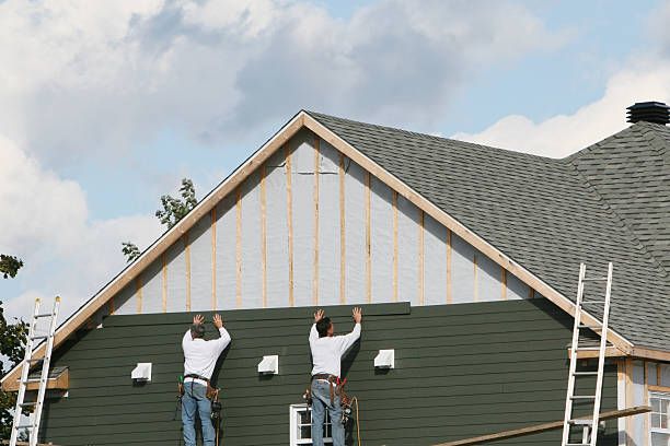 Professional Siding Installation technician working in Austin, IN